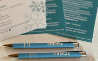 Kugelschreiber und Flyer der Berse GmbH.