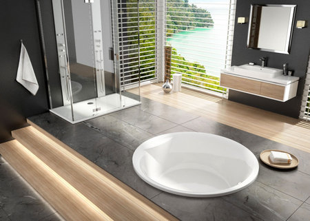 Runde Badewanne in einem Badezimmer.